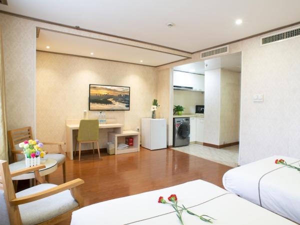 Guangzhou Xin Yue Xin Hotel : photo 4 de la chambre appartement lits jumeaux 
