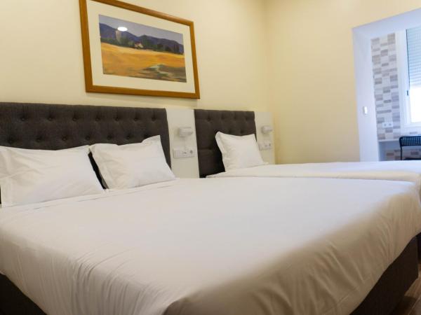 Residencial do Areeiro : photo 1 de la chambre chambre triple