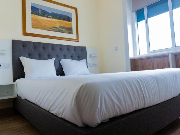 Residencial do Areeiro : photo 2 de la chambre chambre double ou lits jumeaux