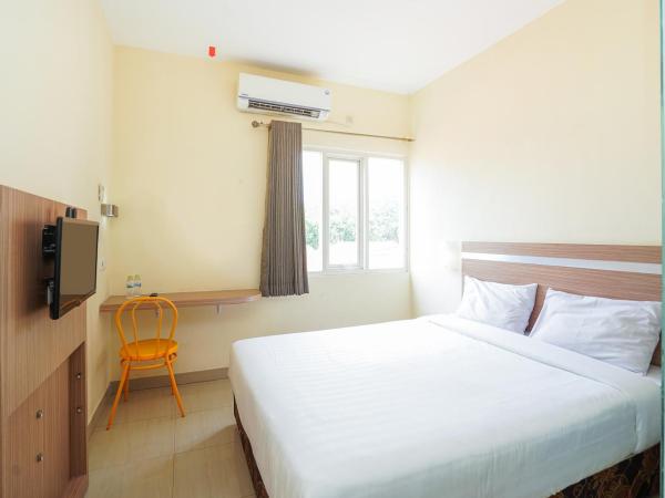 Pratisarawirya Guesthouse by ecommerceloka : photo 6 de la chambre chambre double standard