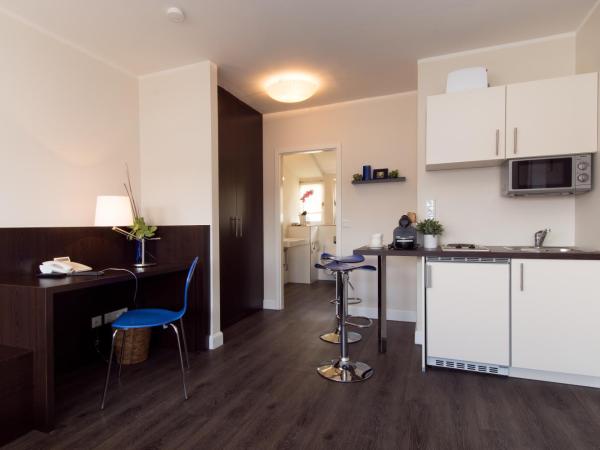 Living am Carlsplatz : photo 2 de la chambre chambre double