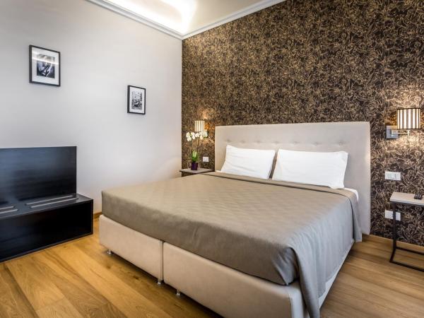 Martelli 6 Suite & Apartments : photo 10 de la chambre chambre triple supérieure