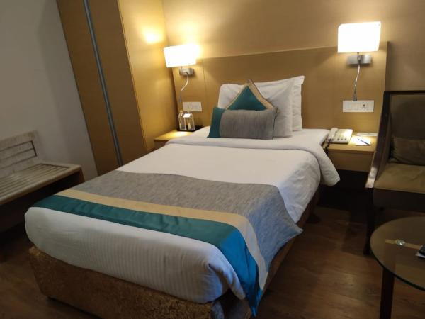 Sarovar Portico Rivera Ahmedabad : photo 1 de la chambre standard single room (15% discount on food and soft beverage)