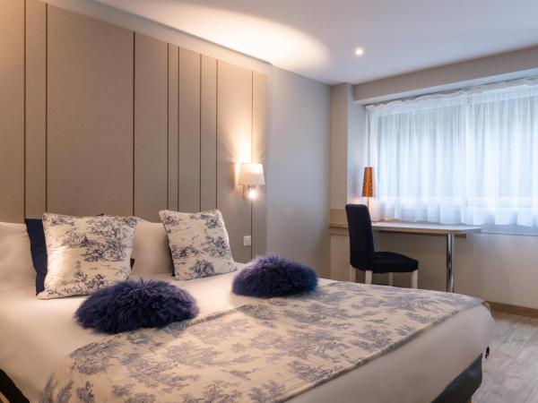 Hôtel de la Plage : photo 7 de la chambre chambre double supérieure - vue sur ville/jardin
