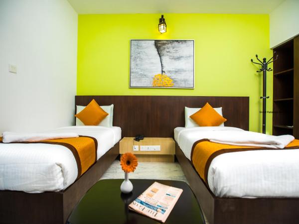 Grand Padappai Residency : photo 8 de la chambre chambre lits jumeaux avec balcon