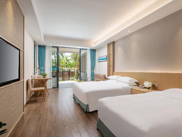 Sanya South China Hotel : photo 1 de la chambre chambre triple jardin