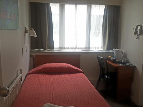 Kiwi International Hotel : photo 4 de la chambre chambre simple Économique avec salle de bains commune