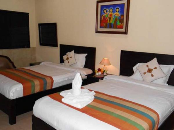 Alam Jogja Resort Mitra RedDoorz : photo 5 de la chambre chambre lits jumeaux