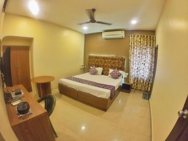 new metro residency : photo 2 de la chambre chambre lit king-size deluxe