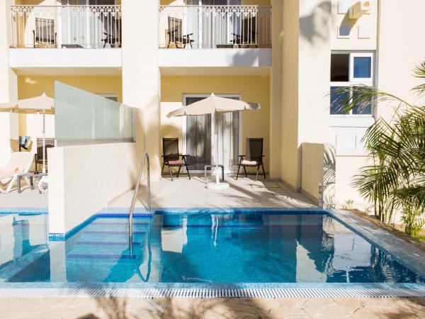 Riu Palace Cabo San Lucas - All Inclusive : photo 4 de la chambre suite junior avec accès direct à la piscine - réservée aux adultes (18 ans et plus)
