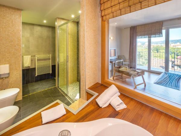 Hotel San Marco Fitness Pool & Spa : photo 1 de la chambre suite deluxe avec baignoire spa