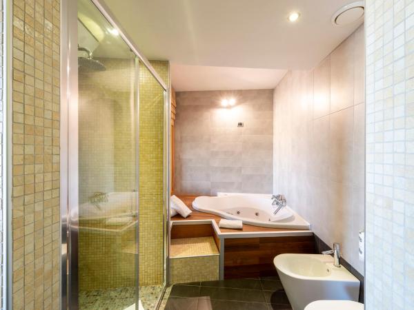 Hotel San Marco Fitness Pool & Spa : photo 2 de la chambre suite deluxe avec baignoire spa