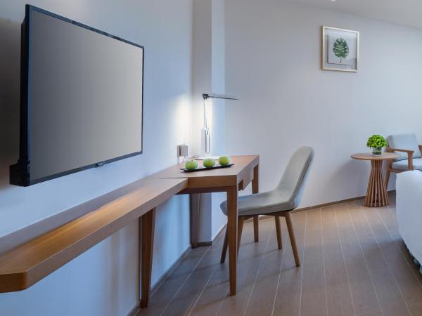 Sanya South China Hotel : photo 2 de la chambre chambre lits jumeaux Élégante - vue sur jardin