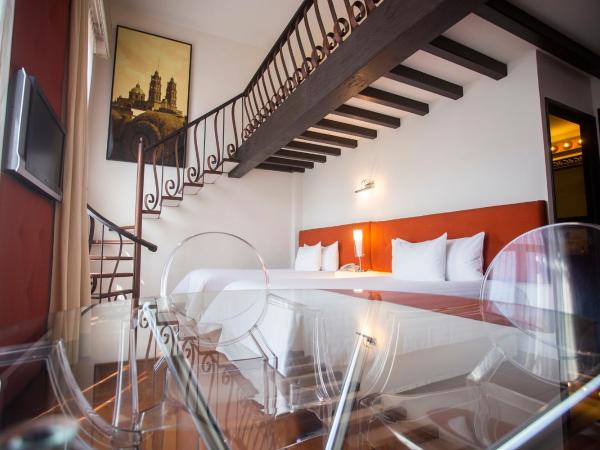 Hotel Herencia By Hosting House : photo 4 de la chambre suite familiale