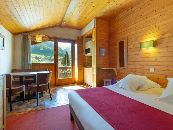 Hôtel Les Côtes, Résidence Loisirs et Chalets : photo 1 de la chambre chambre familiale (2 adultes et 2 enfants)