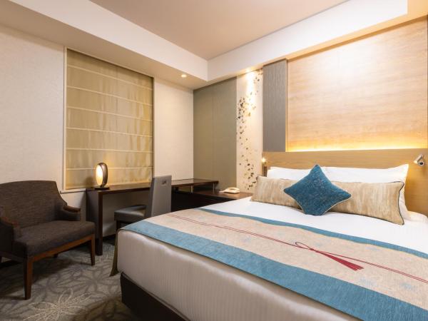 Hotel Metropolitan Tokyo Marunouchi : photo 1 de la chambre hébergement lit queen-size 20 m² - sans vue