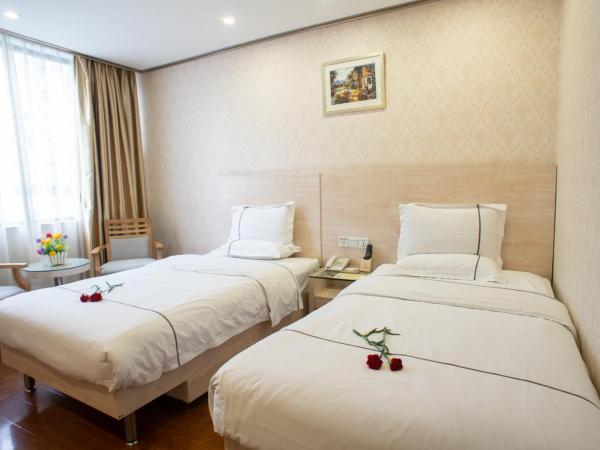 Guangzhou Xin Yue Xin Hotel : photo 1 de la chambre chambre double ou lits jumeaux premier
