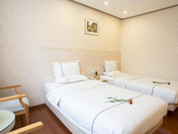 Guangzhou Xin Yue Xin Hotel : photo 3 de la chambre chambre double ou lits jumeaux premier