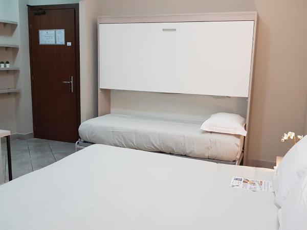 Hotel Gran Torino : photo 5 de la chambre chambre triple