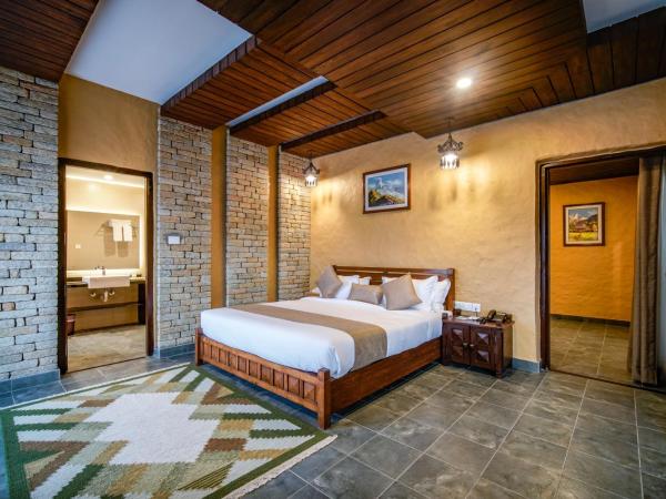 Bar Peepal Resort : photo 2 de la chambre suite exécutive avec transferts aéroport gratuits