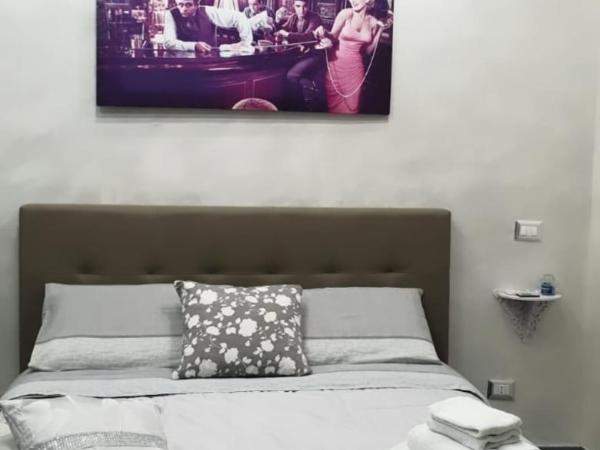 B&B Rosy : photo 1 de la chambre chambre double de luxe avec balcon et salle de bains privative