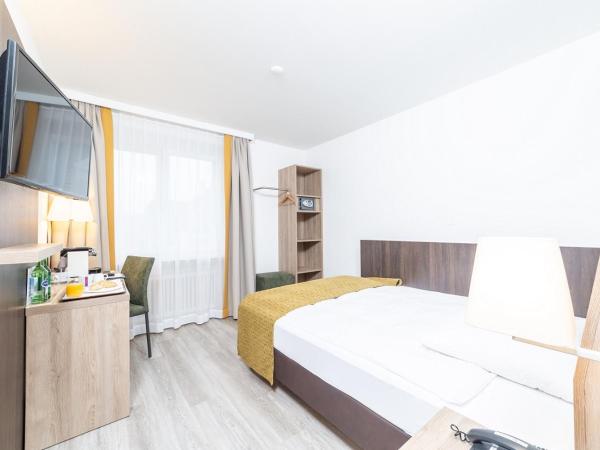 Hotel Alfa : photo 3 de la chambre chambre lit queen-size moderne 