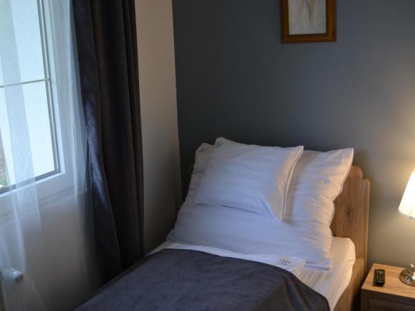 Főnix Design Rooms : photo 9 de la chambre chambre simple