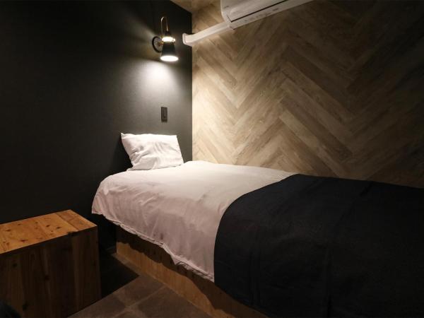 Maison Sapporo : photo 3 de la chambre chambre quadruple avec salle de bains