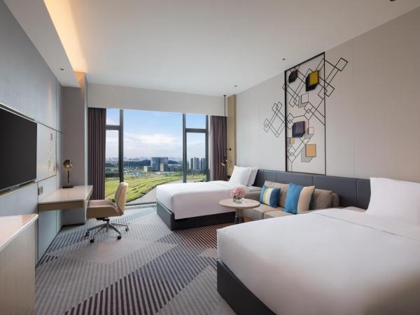 Crowne Plaza Foshan Nanhai - an IHG Hotel - Free Canton Fair Shuttle Bus : photo 1 de la chambre chambre deluxe avec 2 lits doubles