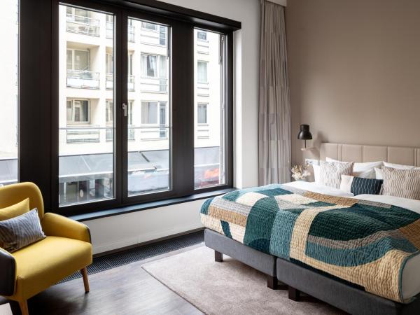 numa I Nook Rooms & Apartments : photo 4 de la chambre chambre moyenne
