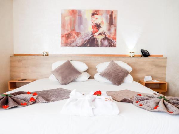 Mabrouk Hotel and Suites- Adult only : photo 9 de la chambre chambre double