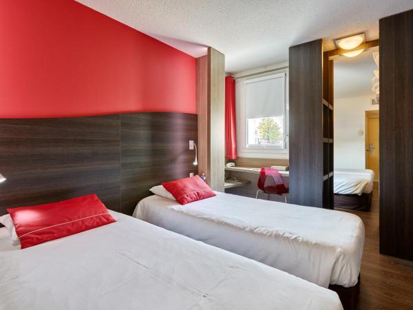 Kyriad La Roche Sur Yon : photo 1 de la chambre chambre double avec 2 lits simples