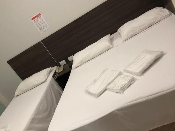 Center Plaza Hotel : photo 7 de la chambre chambre triple standard