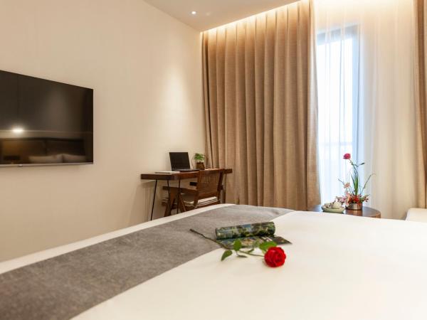 Liangyun SSAW Boutique Hotel : photo 3 de la chambre chambre lit king-size deluxe