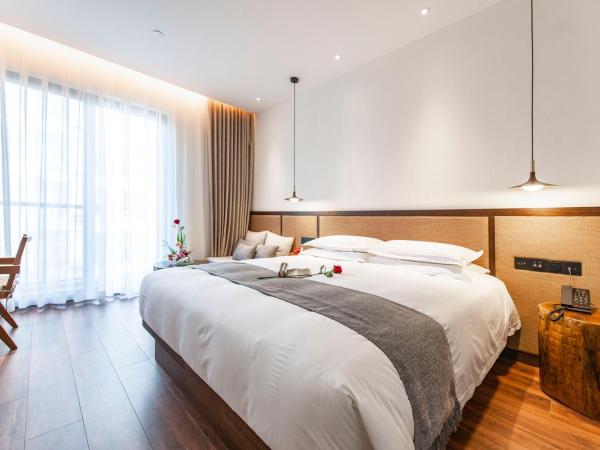 Liangyun SSAW Boutique Hotel : photo 7 de la chambre chambre lit king-size deluxe