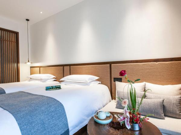 Liangyun SSAW Boutique Hotel : photo 2 de la chambre chambre lits jumeaux deluxe