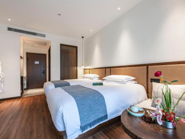 Liangyun SSAW Boutique Hotel : photo 4 de la chambre chambre lits jumeaux deluxe