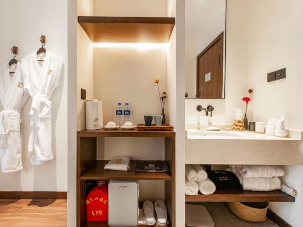 Liangyun SSAW Boutique Hotel : photo 6 de la chambre chambre lits jumeaux deluxe