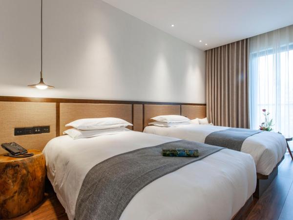 Liangyun SSAW Boutique Hotel : photo 7 de la chambre chambre lits jumeaux deluxe