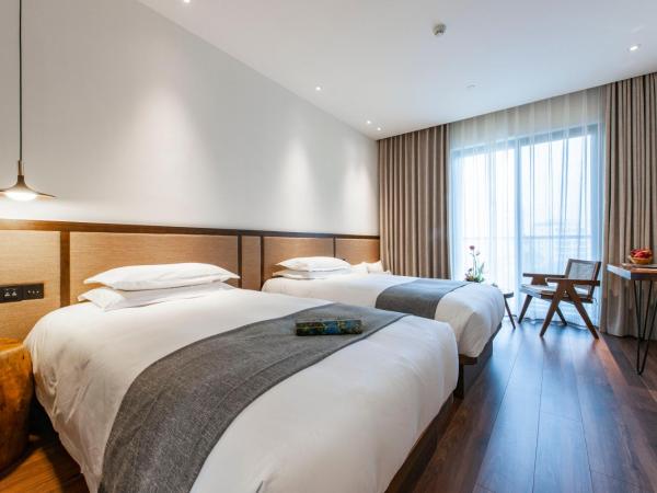 Liangyun SSAW Boutique Hotel : photo 8 de la chambre chambre lits jumeaux deluxe