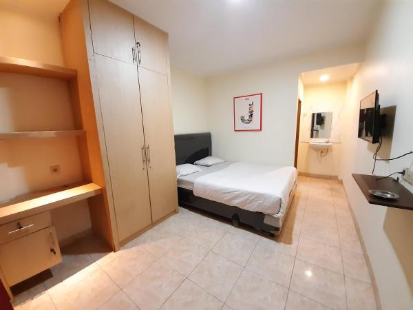 KK Wisma Berkat : photo 3 de la chambre chambre double
