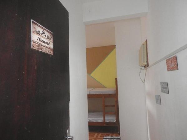 Rio Surf House Hostel e Pousada : photo 6 de la chambre lit simple dans dortoir de 8 lits avec climatisation