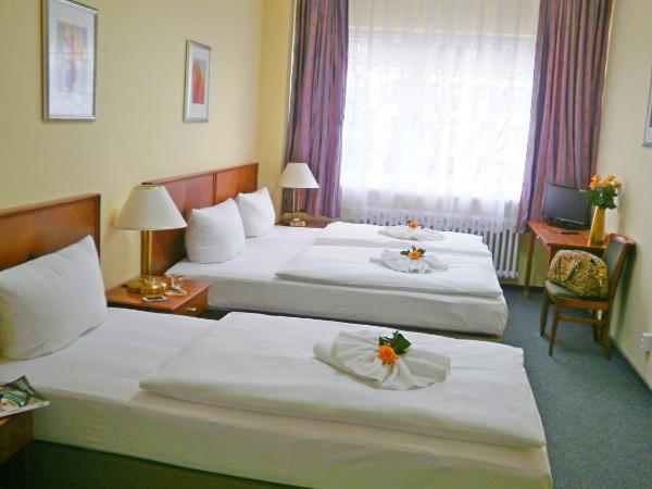 Hotel Amadeus Central : photo 4 de la chambre chambre triple confort