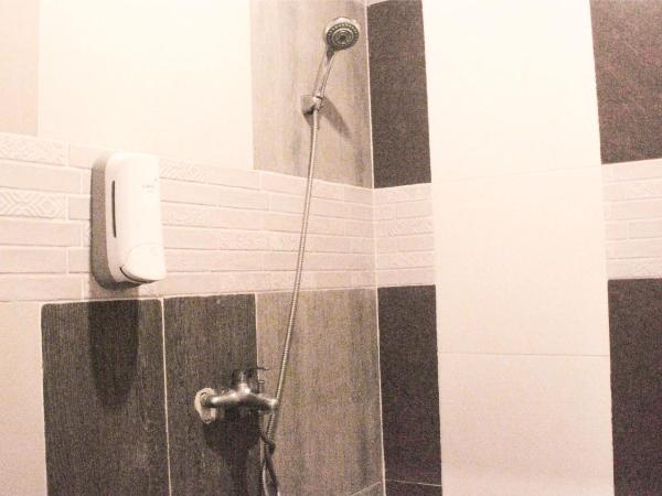 nDalem Joglo Krawitan Syariah : photo 5 de la chambre chambre triple supérieure