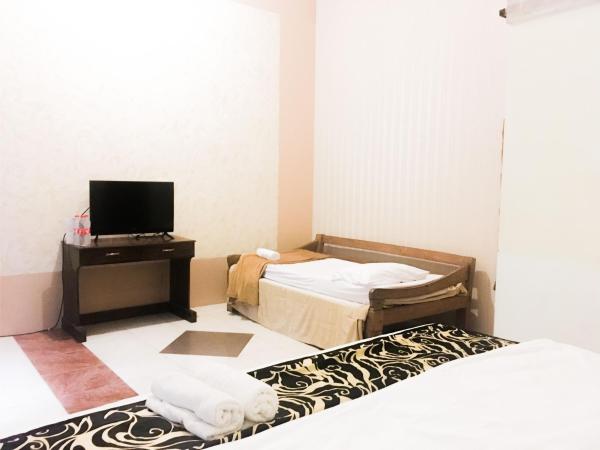 nDalem Joglo Krawitan Syariah : photo 3 de la chambre chambre triple supérieure