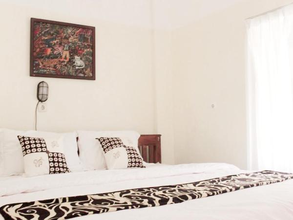 nDalem Joglo Krawitan Syariah : photo 1 de la chambre chambre triple supérieure