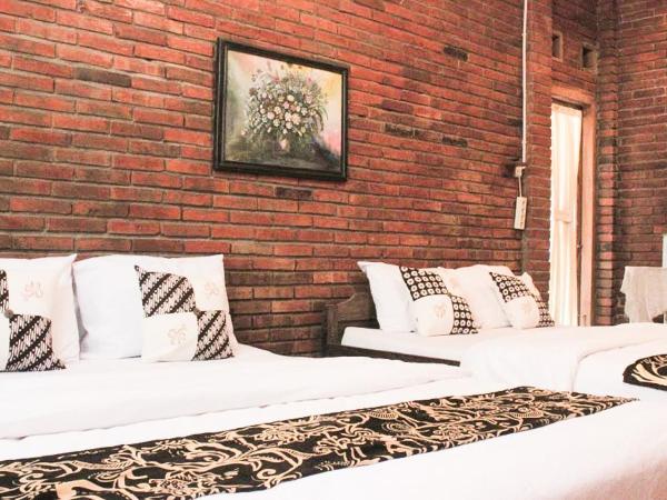 nDalem Joglo Krawitan Syariah : photo 1 de la chambre suite familiale