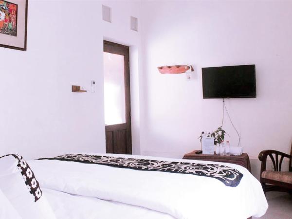 nDalem Joglo Krawitan Syariah : photo 6 de la chambre chambre double deluxe