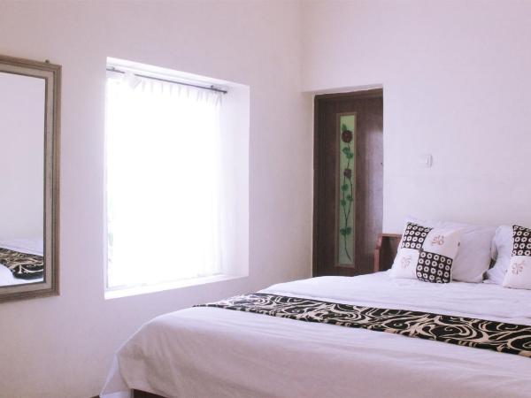 nDalem Joglo Krawitan Syariah : photo 7 de la chambre chambre double deluxe