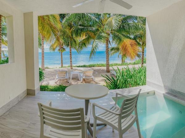 Izla Beach Front Hotel : photo 6 de la chambre hébergement supérieur avec petite piscine - côté océan